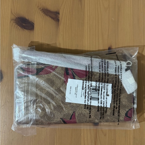 🎁 Coach Long Zip Around Wallet In Signature Canvas With Bow Print - Picture 8 of 9